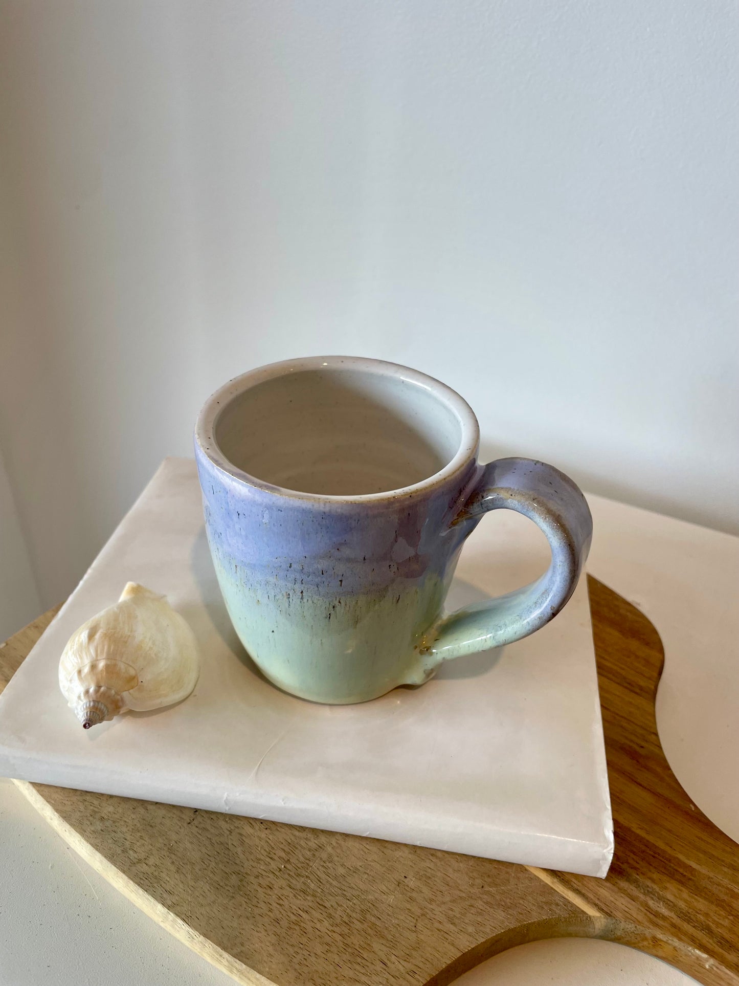 Green and lilac ceramic mug