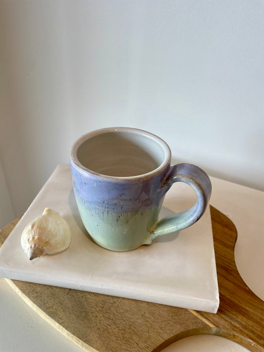 Green and lilac ceramic mug
