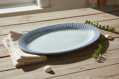 Fluted rim blue oval ceramic platter